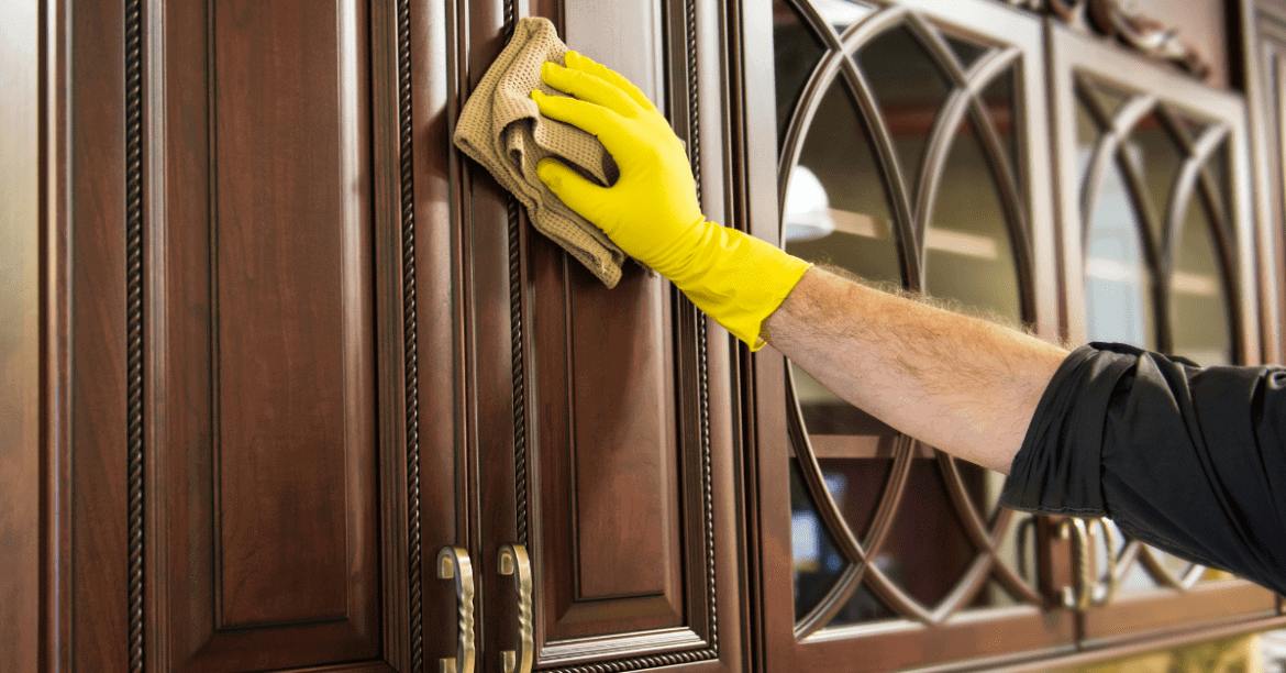 how to clean sticky wooden kitchen cabinets