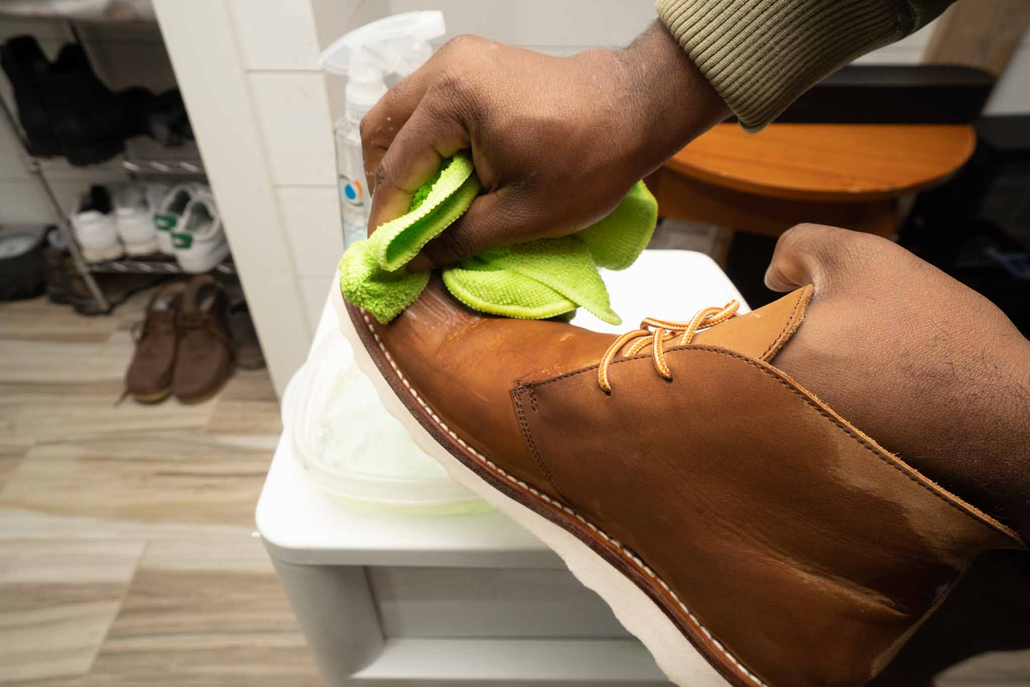 cleaning leather boot with microfiber cloth