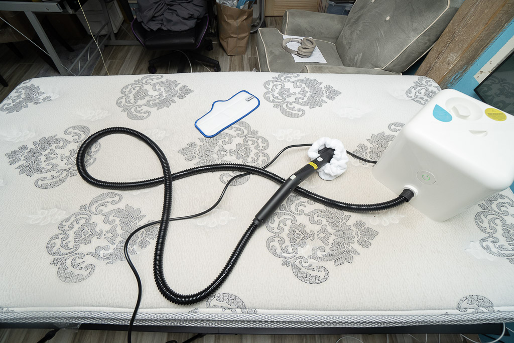 using steam cleaner to clean mattress