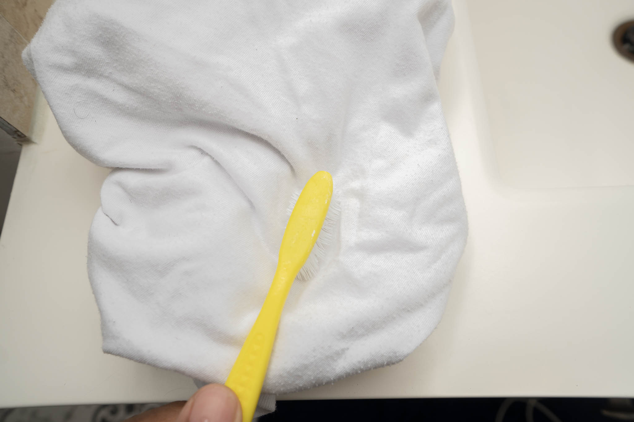 Using Toothbrush on clothes