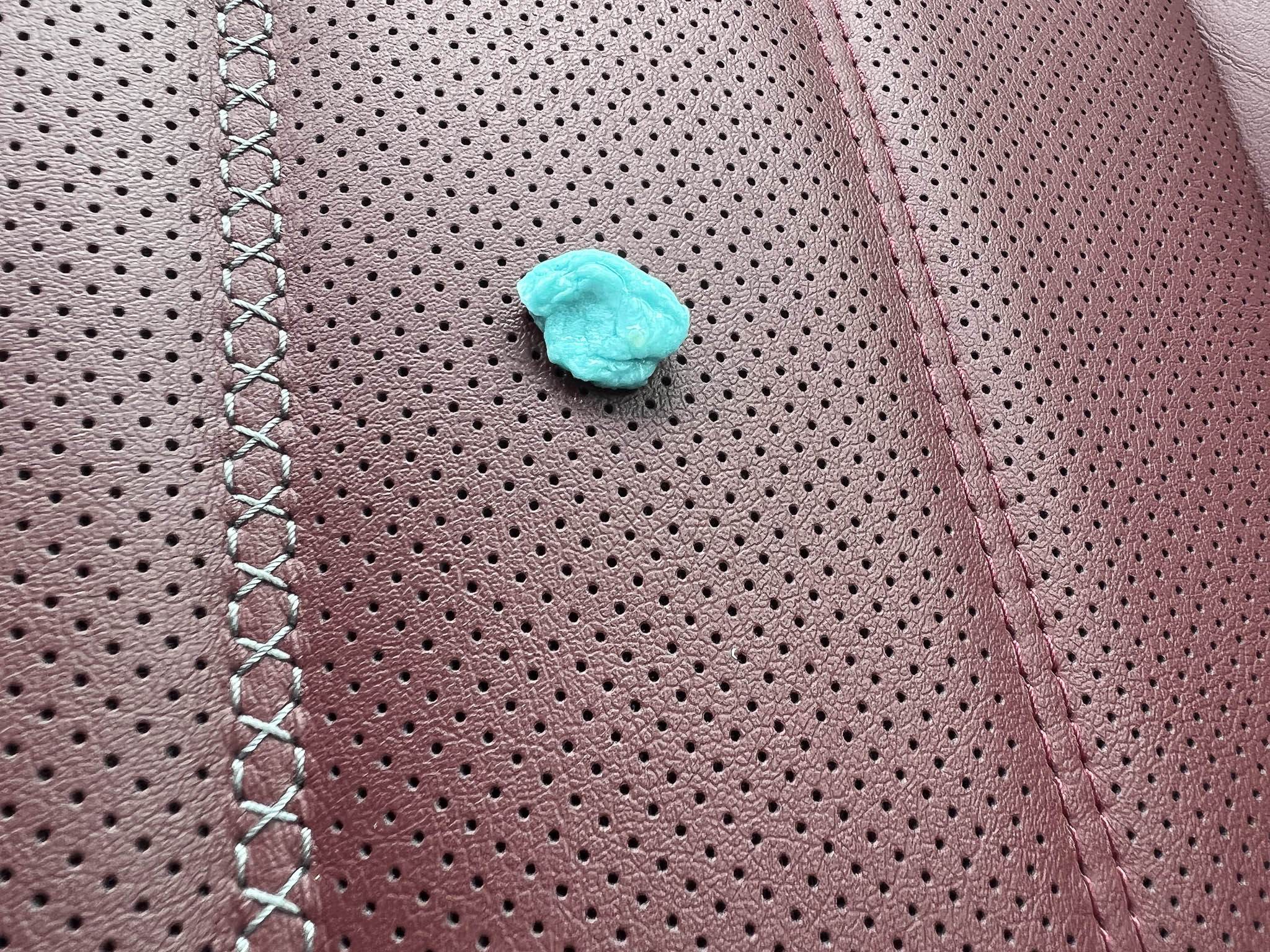 gum on leather seat
