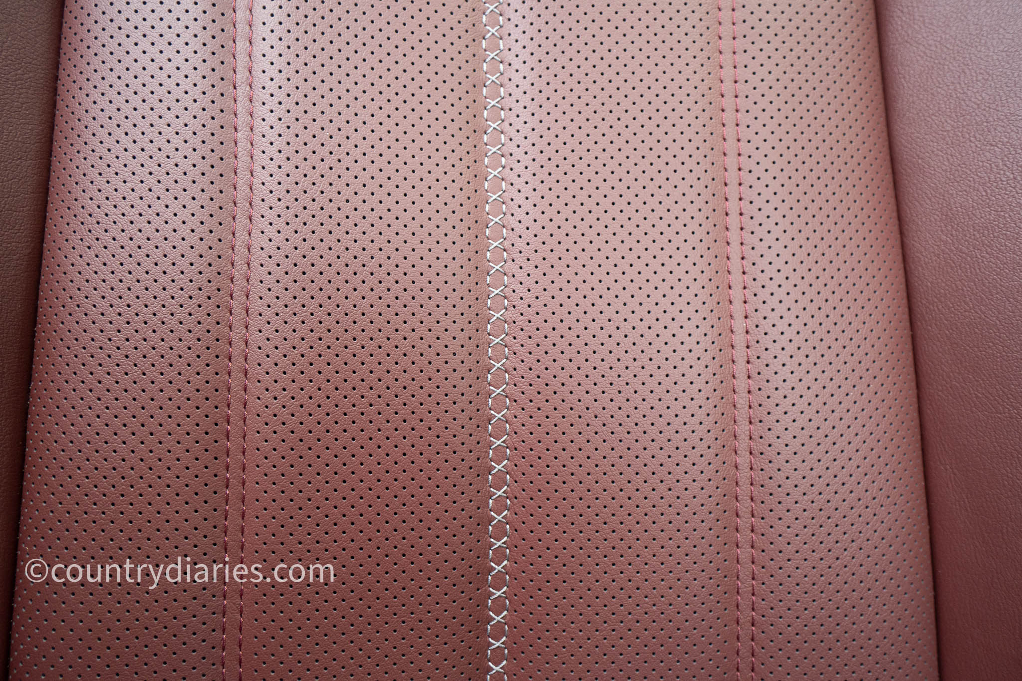 leather car seat with perforated holes