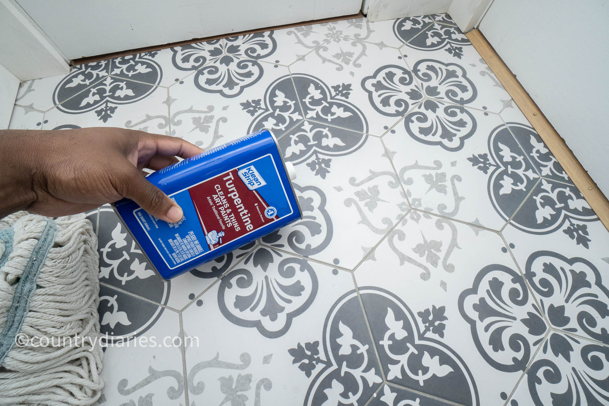 using paint thinner to clean paint off tile