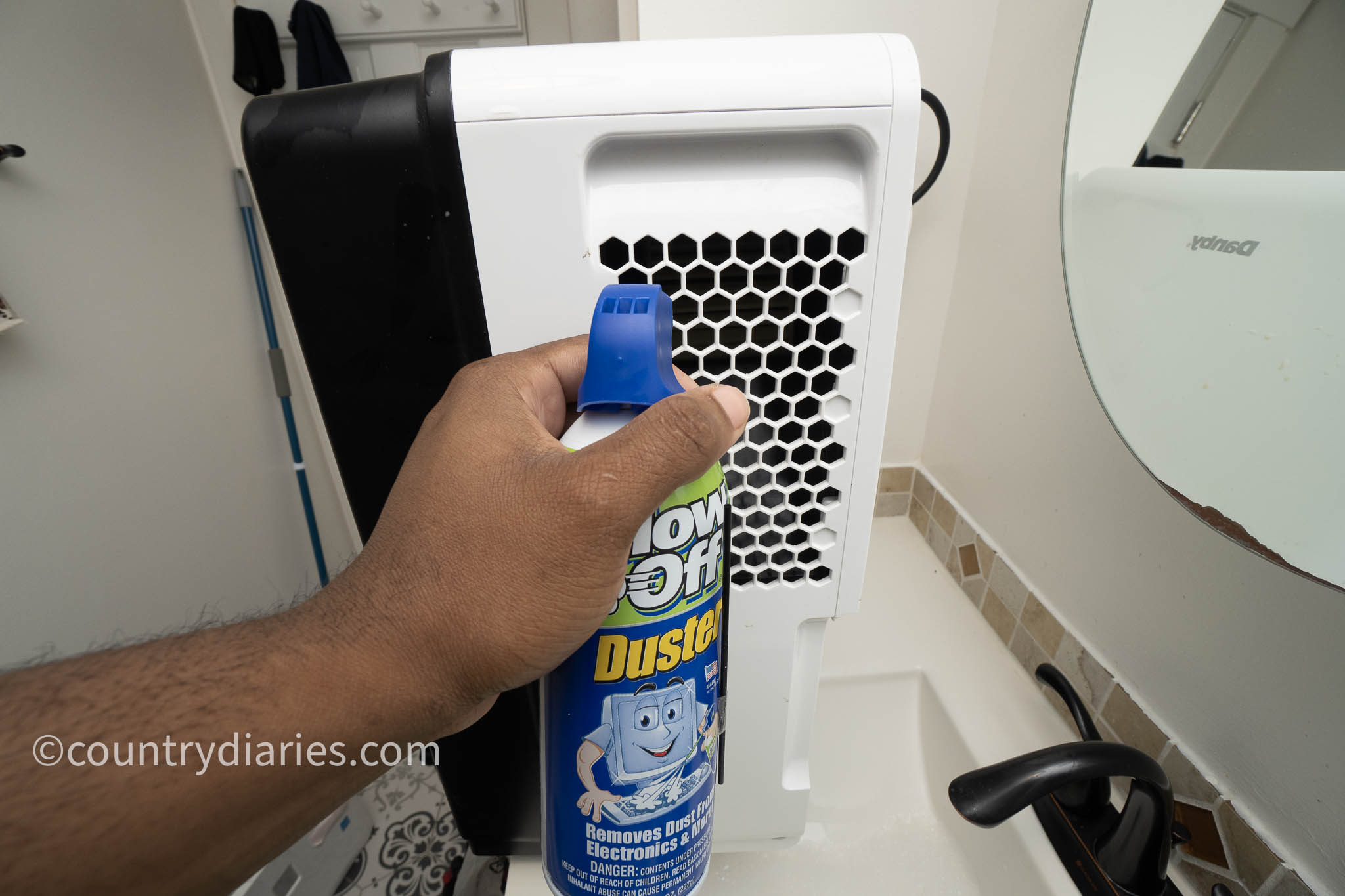 cleaning dehumidifier fan with compress air