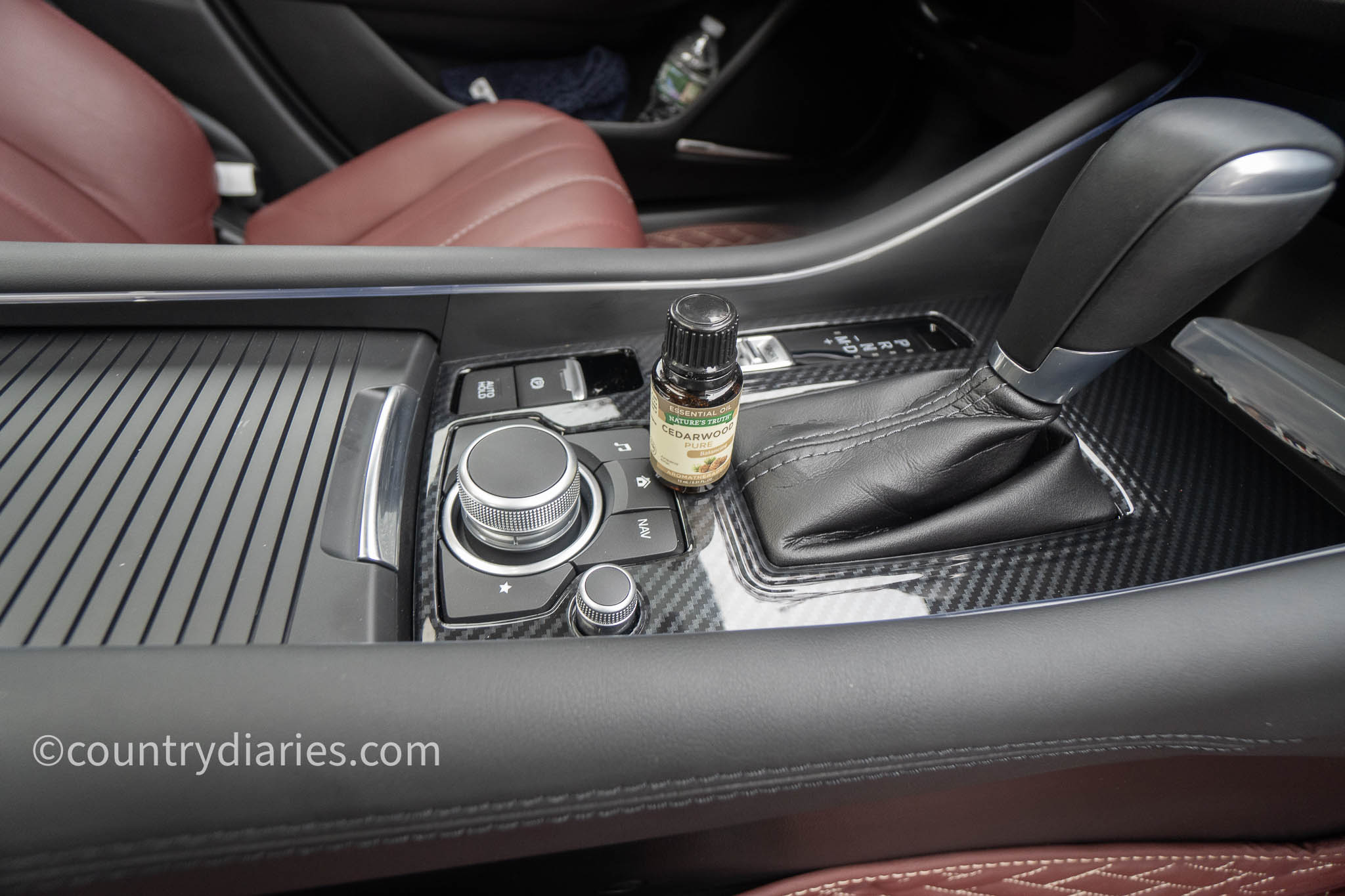 Essential oil on car center console